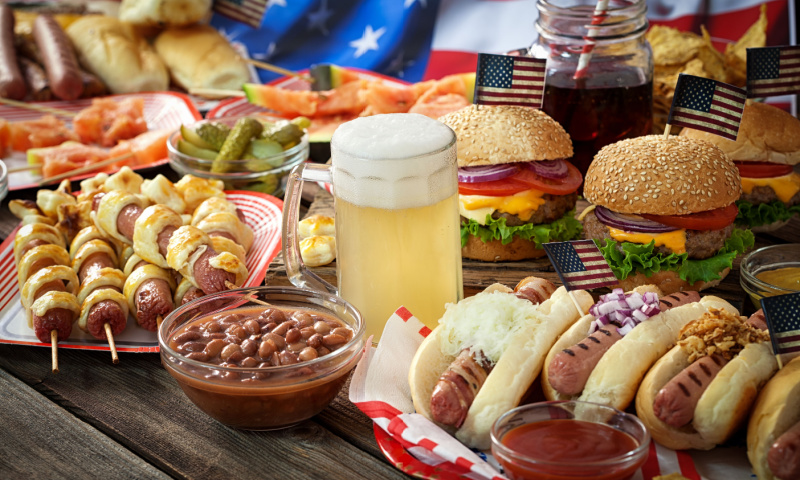 american picnic table burgers hot dogs plate