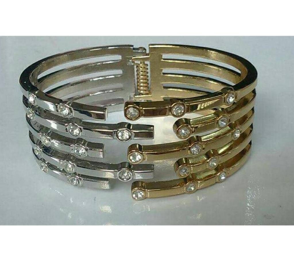 Silver and golden color stone setting bracelet
