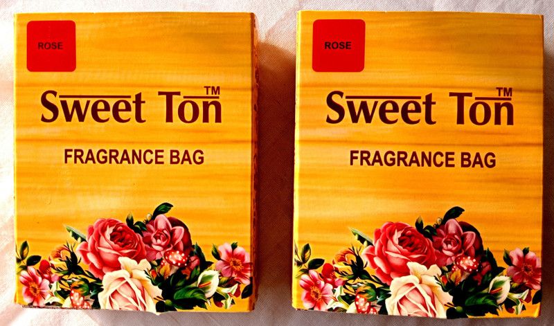 sweet ton from incendio Rose Jute Perfume Portable Car Air Purifier  (Red)
