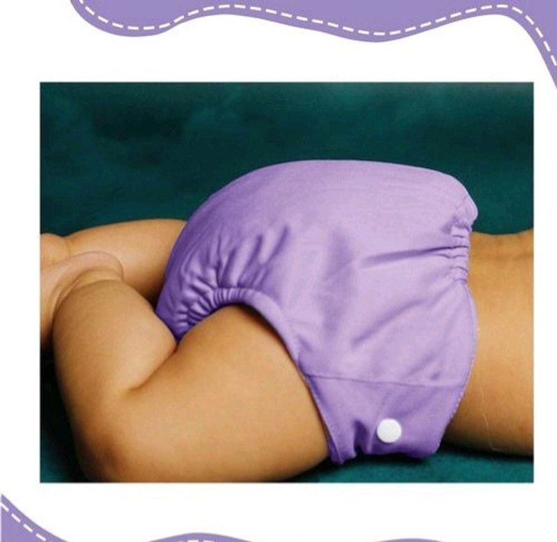 Diptych enterprises Reusable and washable baby adjustable cloth button diaper/bed protector