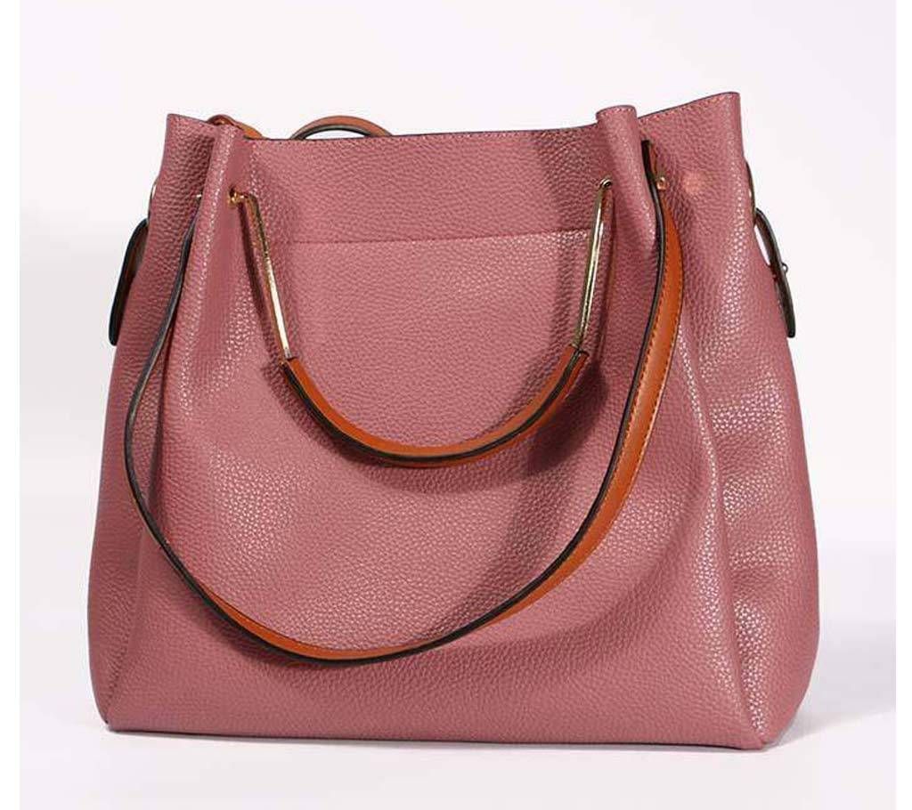 Ladies pink color handbag