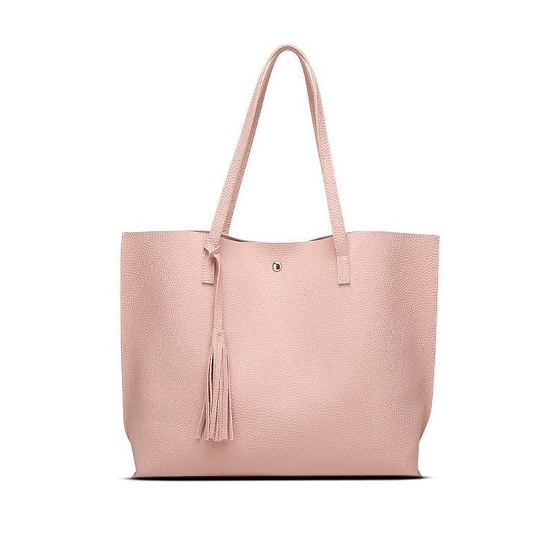 The new Korean fashion simple tassel handbag, large capacity bags