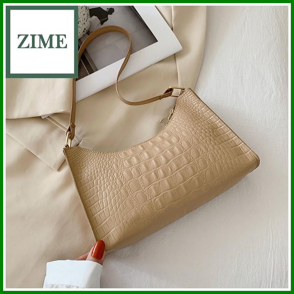 Casual fashion texture one shoulder underarm women's bag summer new trendy simple solid color messenger baguette bag