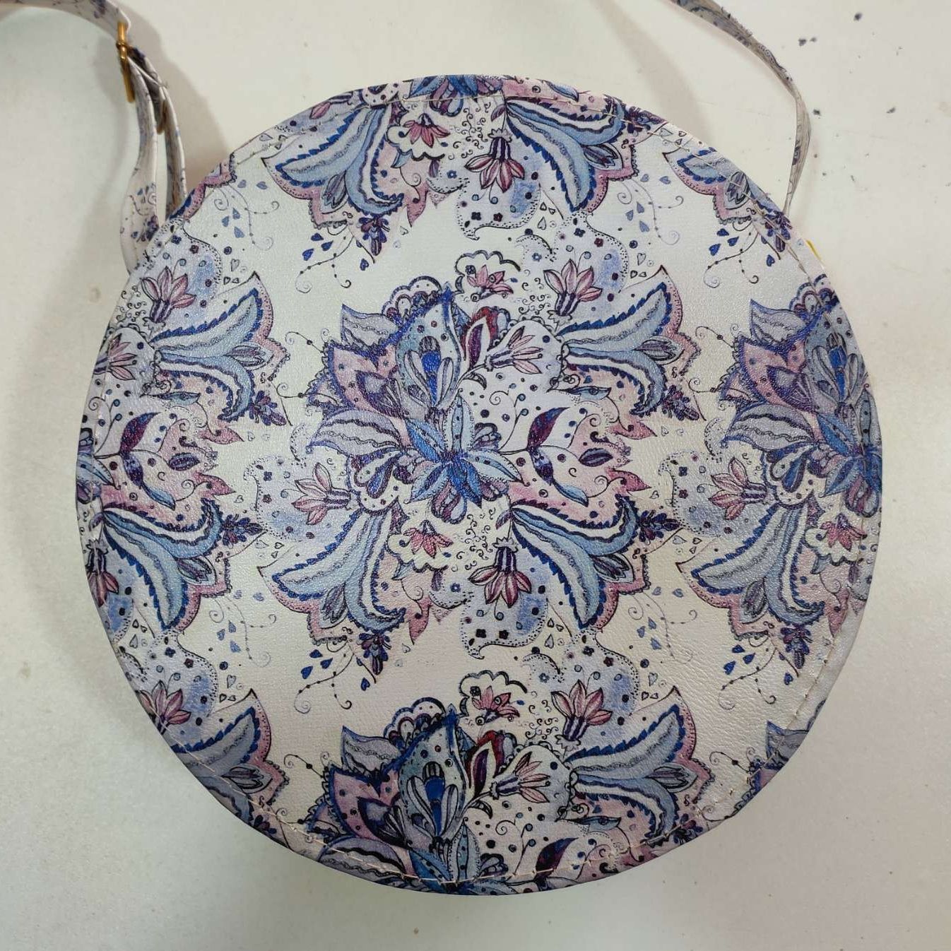 Round shoulder and cross body bag