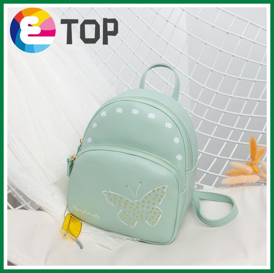 Autumn and winter new large-capacity simple printing bag rivet butterfly backpack women