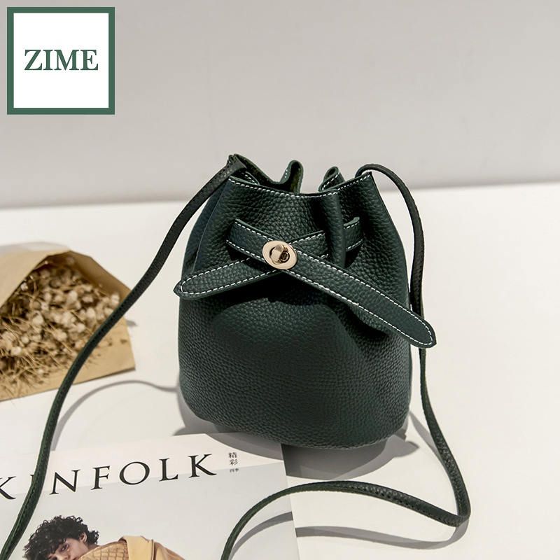ZIME Women 's bag lychee pattern bucket-shaped drawstring lock core shoulder bag summer and autumn Korean version of the messenger small bag trendy