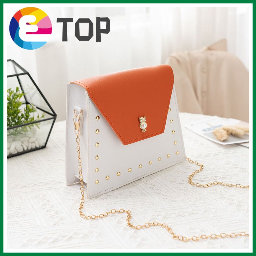 Korean version of women 's contrast color rivet chain small square bag summer and autumn cross-body shoulder bag