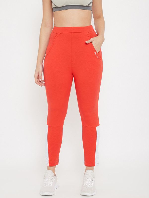 Women Solid Orange Track Pants