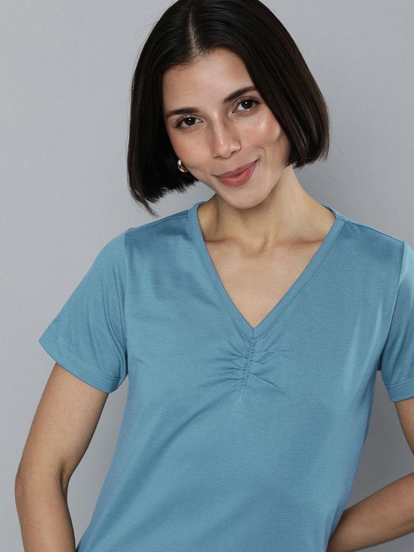 Women Solid V Neck Polyester Blue T-Shirt