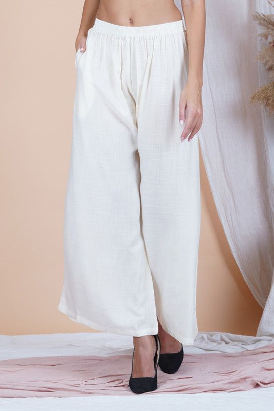 Women Flared Cream Viscose Rayon Trousers