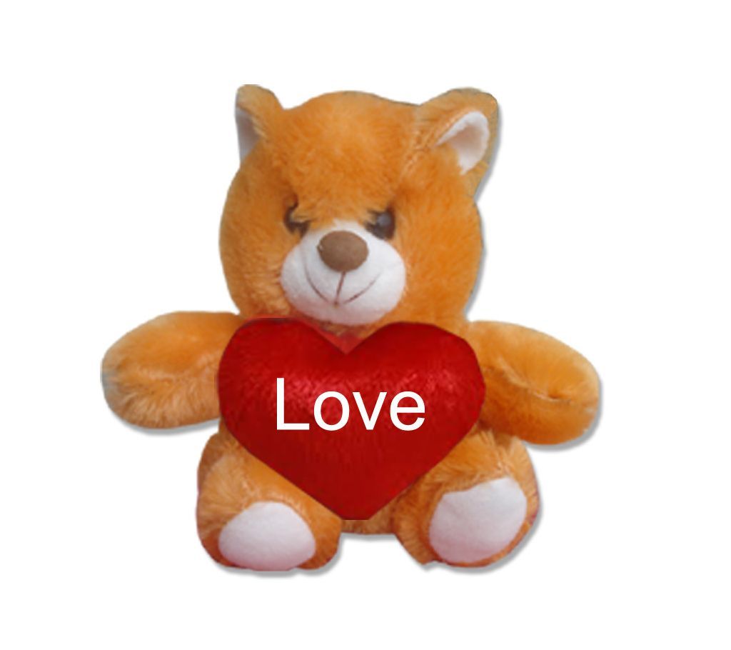 Small cute teddy bear with red heart and the text "Love"
