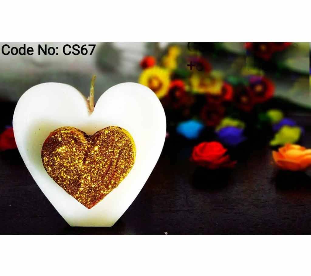 Heart Shaped White And Golden Candle