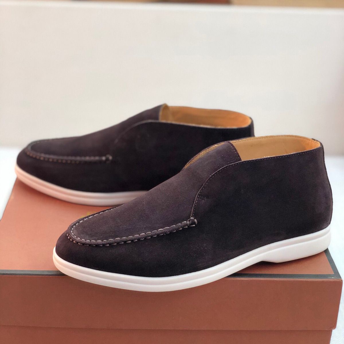 Loro Piana  top layer is made of cast cow leather fabric and water dyed cow leather lining.