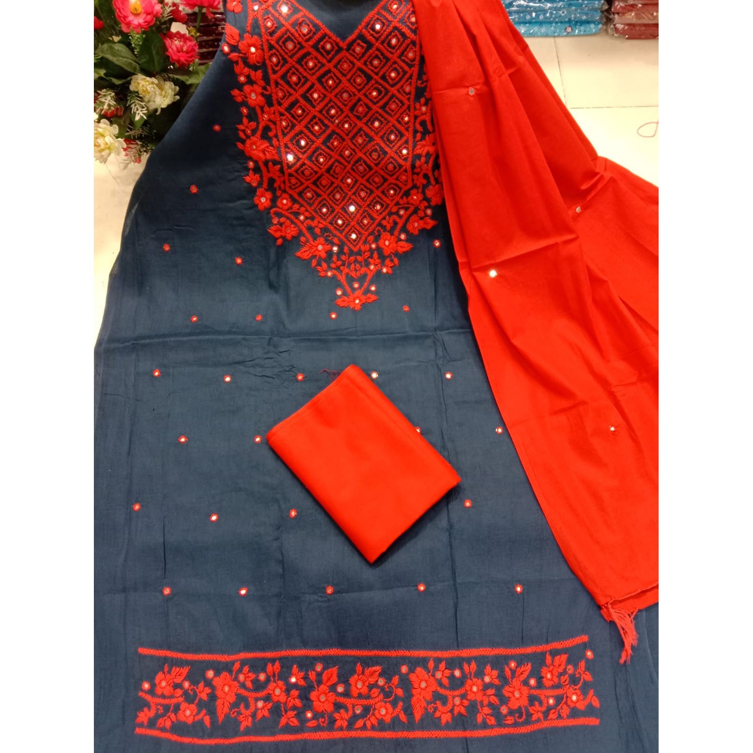 Exclusive hand work unstitched standard three piece for women.