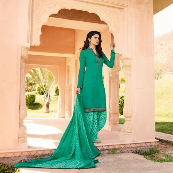 New Design Gorgeous Unstitched VINAY SILKINA ROYAL CREPE 16 PATIALA STYLE SALWAR KAMEEZ CATALOG . Beautiful Embroidery Designer Party Wear Suits Comes With Heavy Lace And Dupatta.