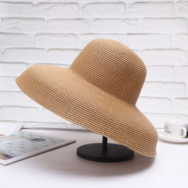 Summer Hepburn style Wind Retro Sun Hat Wide side Visor Female Holiday Sunscreen Beach Hat Fashion Wild Sun Hat Big Grass Hat