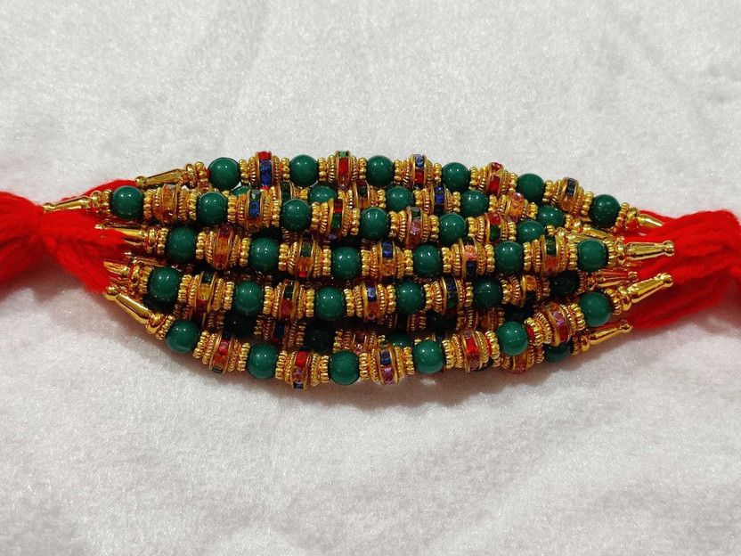 Rakhi Set  (PACK OF 10 , 1 ROLI & 1 CHAWAL)
