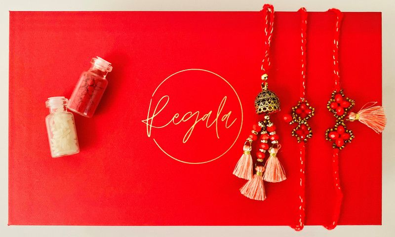 Rakhi, Lumba, Chawal Roli Pack, Greeting Card Set  (Rakhi, Confectionary, Roli Chawal set, Jute bag, Gift box)