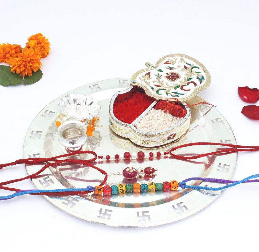 Chawal Roli Pack, Thali, Rakhi Set  (1 Deepak, 1 Loti, 3 Rakhi, 1 Apple Shape Chopda, 1 Swastika Thali)