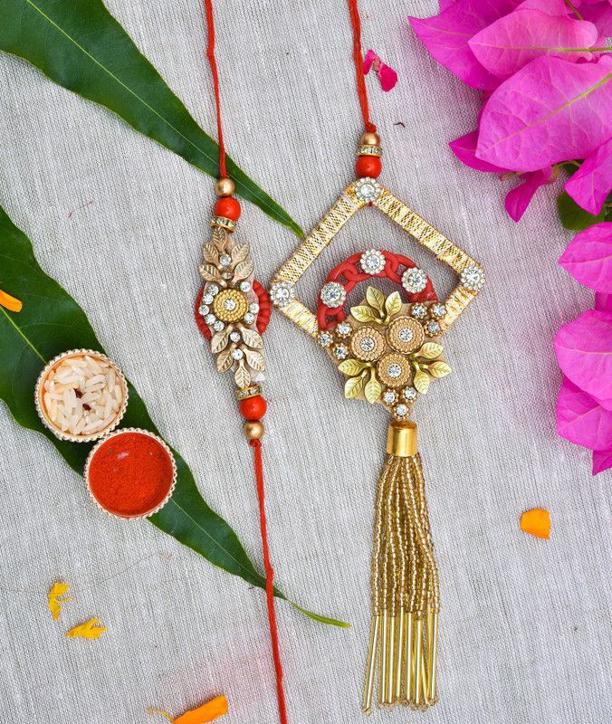 Rakhi, Chawal Roli Pack, Lumba Set  (1 LADIES LUMBA, 1 GENTS RAKHI, 1 Set Of Roli,Chawal, Rakhi In reusable Plastic Box)