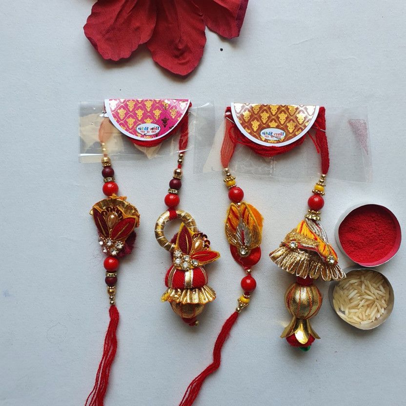 Rakhi, Chawal Roli Pack, Lumba Set  (2 Rakhi,2 Lumba, 1 roli, 1 Chawal)