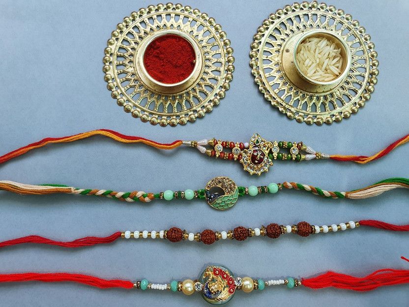 Chawal Roli Pack, Rakhi Set  (4 Rakhi:Roli Chawal)