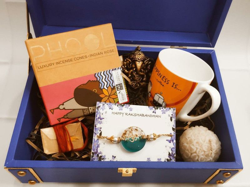 Rakhi Set  (Rakhi for Bhai with Mug, Phool incense cone,candle,Ganesha ji & Roli chawal)
