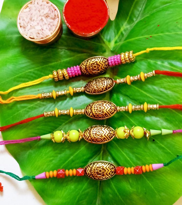 Rakhi Set  (Set of 5 Handmade Rakhi, Roli, Akshat)
