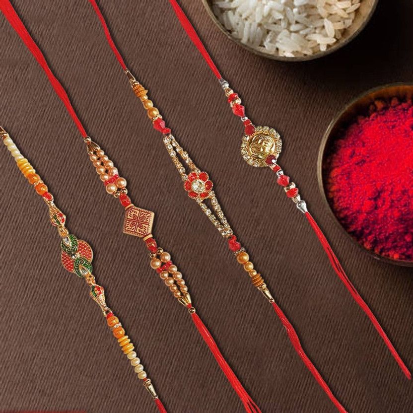 Rakhi, Chawal Roli Pack Set  (4 Rakhi, 1 Pack Roli Chawal)