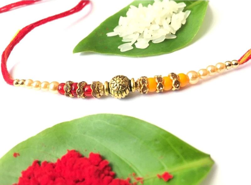 Rakhi, Chawal Roli Pack Set  (Combo of 3 rakhi with orange and red moti, Dora Rakhi Set for bhai, with with Roli Chawal Tilak Pack (PACKE OF 2))