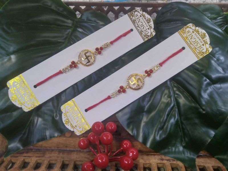 Rakhi Set  (Set Of 2 Religious SWASTIK Rakhi with Gold Metallic Finish)
