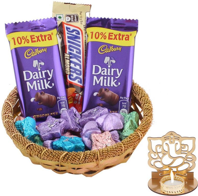 SurpriseForU Chocolate Gift Collection For Loved Ones | Diwali Gift | Shadow Ganesh Diya | Diwali Chocolate Hamper Combo  (1 Golden Katory , 2 Dairy Milk (13.2g) , 1 Snickers Almond (14g) , 5 Star Shaped Chocolate , 1 Shadow Ganesh Diya)