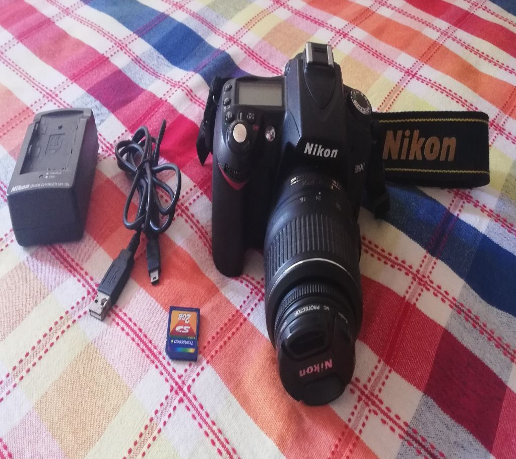 Owner used Nikon D90 with 18-55mm lens + charger + 2GB memory card