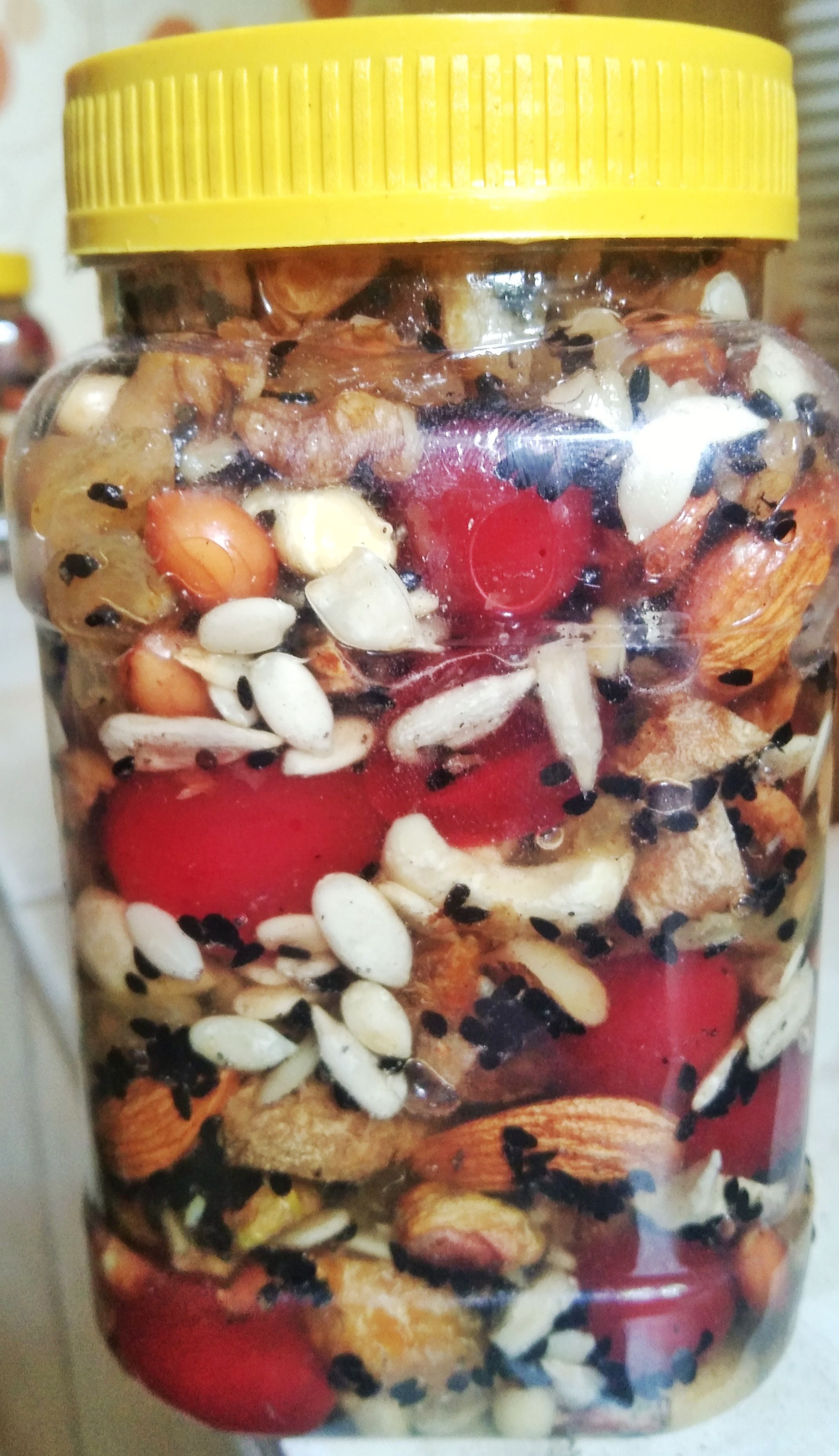 Mixed dry fruits with nuts honey almond honey mix nut honey drama500 gm