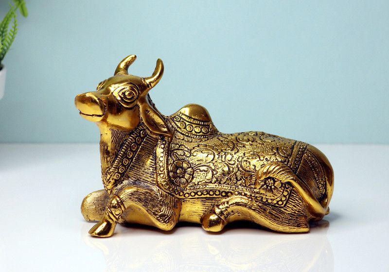 Shree Shyam Handicraft Nandi Cow Spiritual Vastu Nandi Pooja Figurine Sculpture, Kamdhenu Designer Stone Studded Gau MATA Animal Puja Idol Gift ans Home Decorative Showpiece - 11 cm  (Metal, Gold)