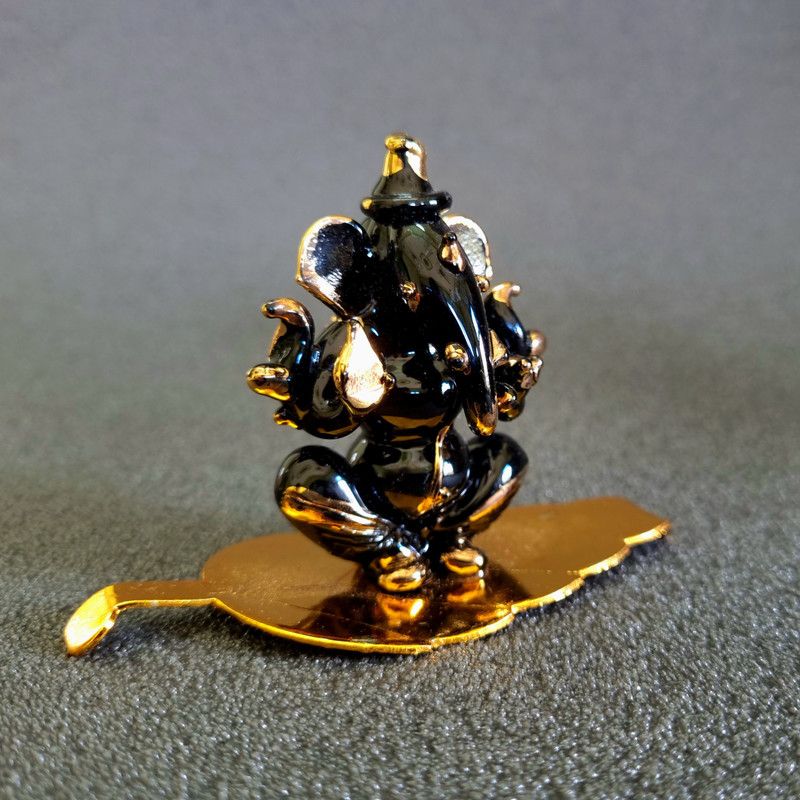 LAVANA (GOLD PLATED) Glass Ganesha Idol glass showpiece, DOUBLE FACE GANESHA, Decorative Showpiece - 6 cm  (Glass, Black)