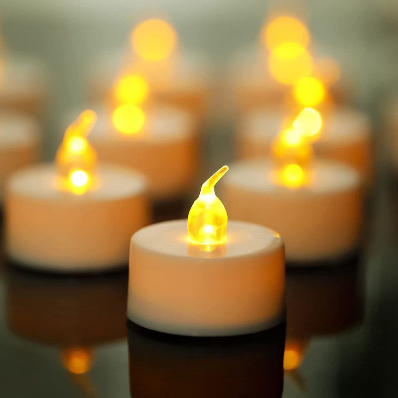 SeaRegal LED Tea Lights Candles – Flickering Flameless Tealight Candle – Long Lasting Battery Operated Fake Candles – Decoration for Wedding, Party and Christmas (Yellow-24pcs) Candle  (Multicolor, Pack of 24)