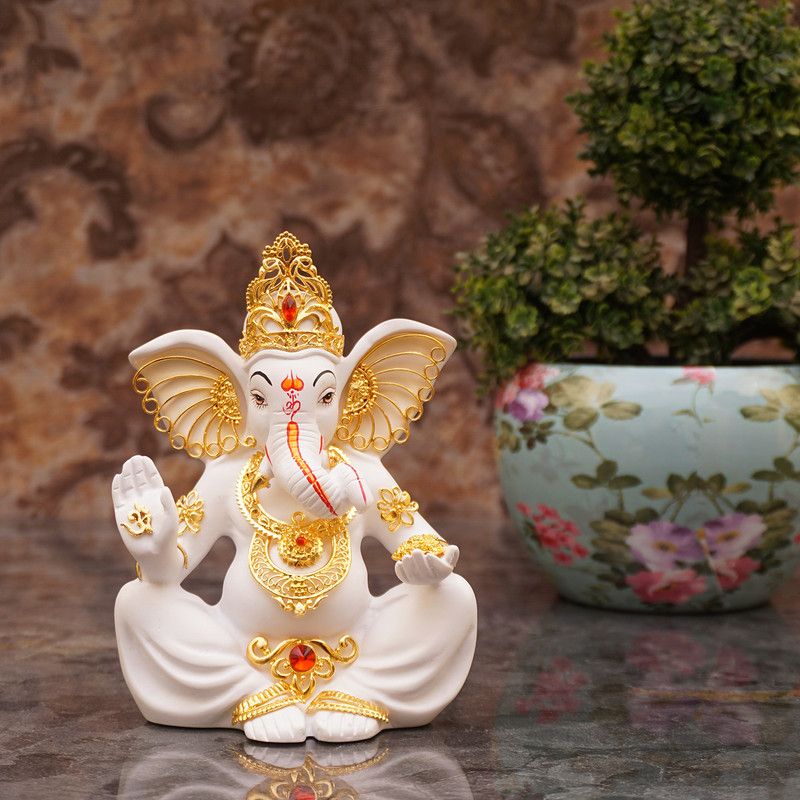StatueStudio Ganesha Statue Ganesh Murti Ganpati Idol for Home Decor, Diwali & New Year Gift Decorative Showpiece - 6.4 cm  (Polyresin, White, Gold)