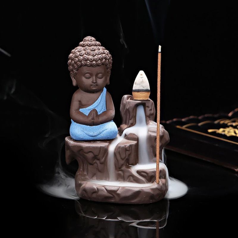 Craft Mansion Handcrafted Meditating Little baby Monk Buddha Smoke Backflow Cone Incense Holder Decorative Showpiece - 12 cm  (Polyresin, Black, Blue)