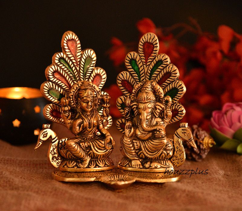 HOUZZPLUS Laxmi Ganesh Idol Statue with Diya Peacock Design Decorative Showpiece - 14 cm  (Aluminium, Gold, Multicolor)