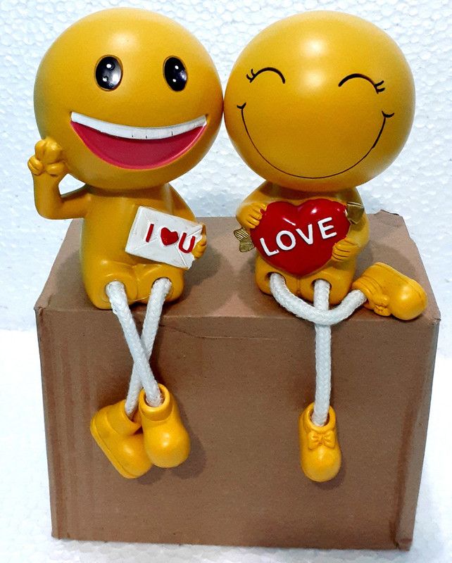 99 Home Decor Hanging Legs Dolls Showpiece For Couple Gifts/Home Decoration/Car Dashboard Decorative Showpiece - 19 cm  (Polyresin, Yellow)