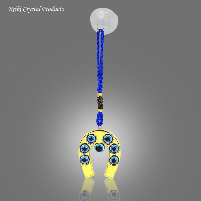 REIKI CRYSTAL PRODUCTS Reiki Crystal Products Feng Shui Evil Eye Golden Horse Shoe, Protection Car and Door Hanging Gift Item 21 cm For Good Luck & Brings Prosperity, Success Decorative Showpiece - 12 cm  (Polyresin, Gold)