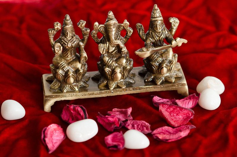 eCraftIndia Antique Finish Laxmi Ganesha Saraswati on Lotus Base Decorative Showpiece - 8 cm  (Brass, Brown)