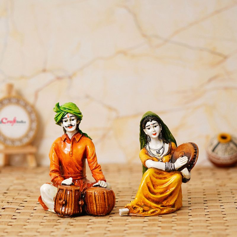 eCraftIndia Colorful Combo of Rajasthani Craftsmen and Lady Playing a Musical Instrument Decorative Showpiece - 14.9 cm  (Polyresin, Multicolor)
