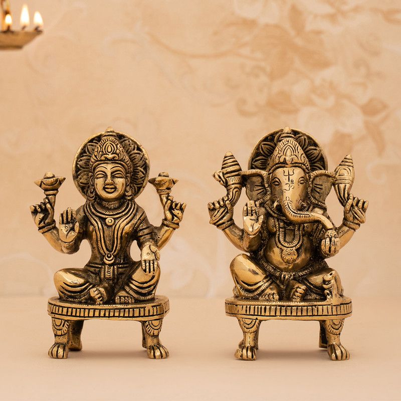 DecorTwist Brass Handcrafted Ganesh and Lakshmi Idol/Statue Set murti for Diwali Pooja Decorative Showpiece - 14.2 cm  (Brass, Gold)