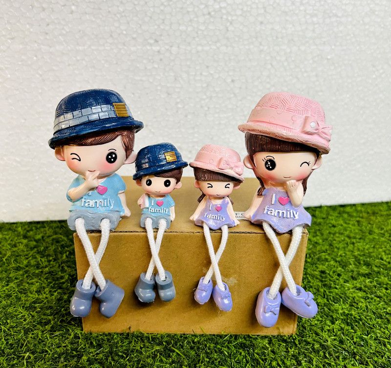 FABULOUS FINDS IMPORTED UNIQUE LEGS HANGING LOVE/FAMILY DOLL SET(4 PCS) Decorative Showpiece - 10.5 cm  (Polyresin, Multicolor)