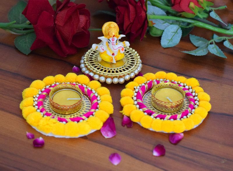 AVIKALP INDIA Set of 3, Handmade Candle Holder with Perfumed Tealight and Idol Ganesh Statue Candle  (Yellow, Pack of 3)