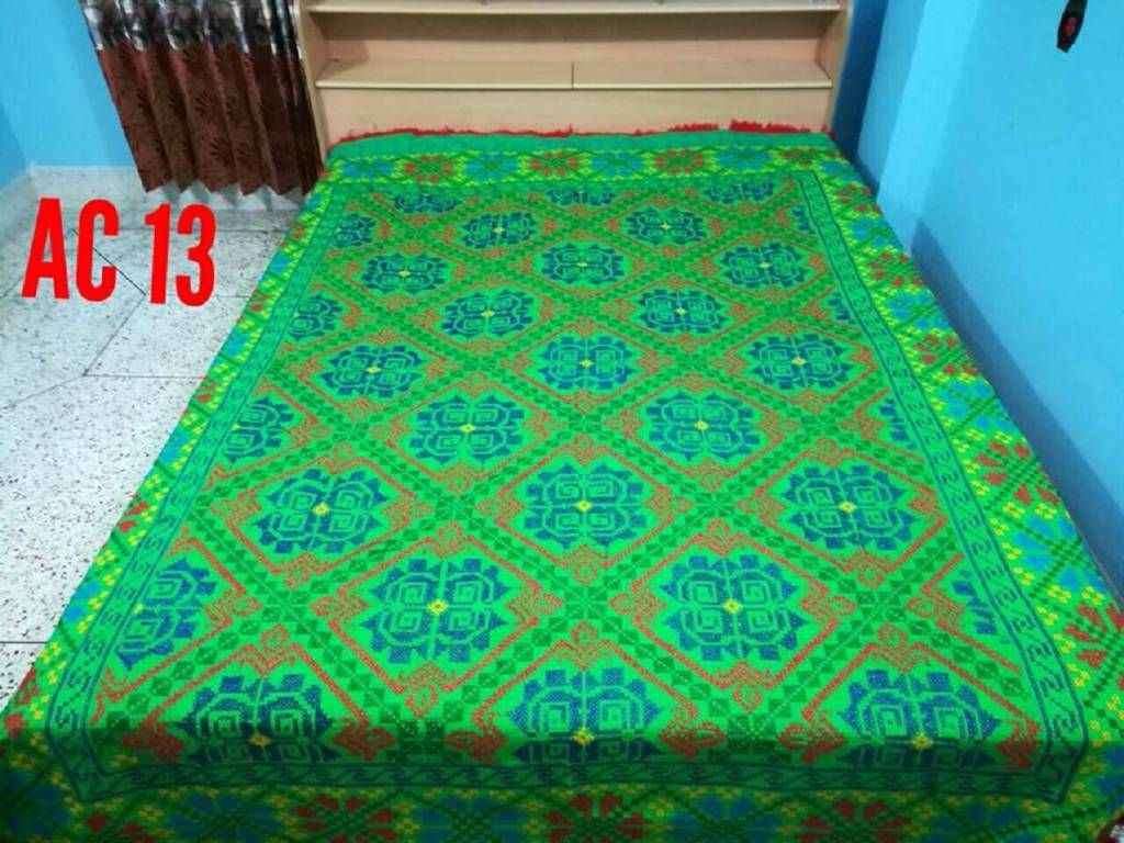 Green hand stitched nokshi katha