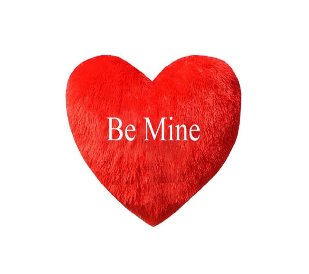 Heart shape pillow with the text "Be Mine"