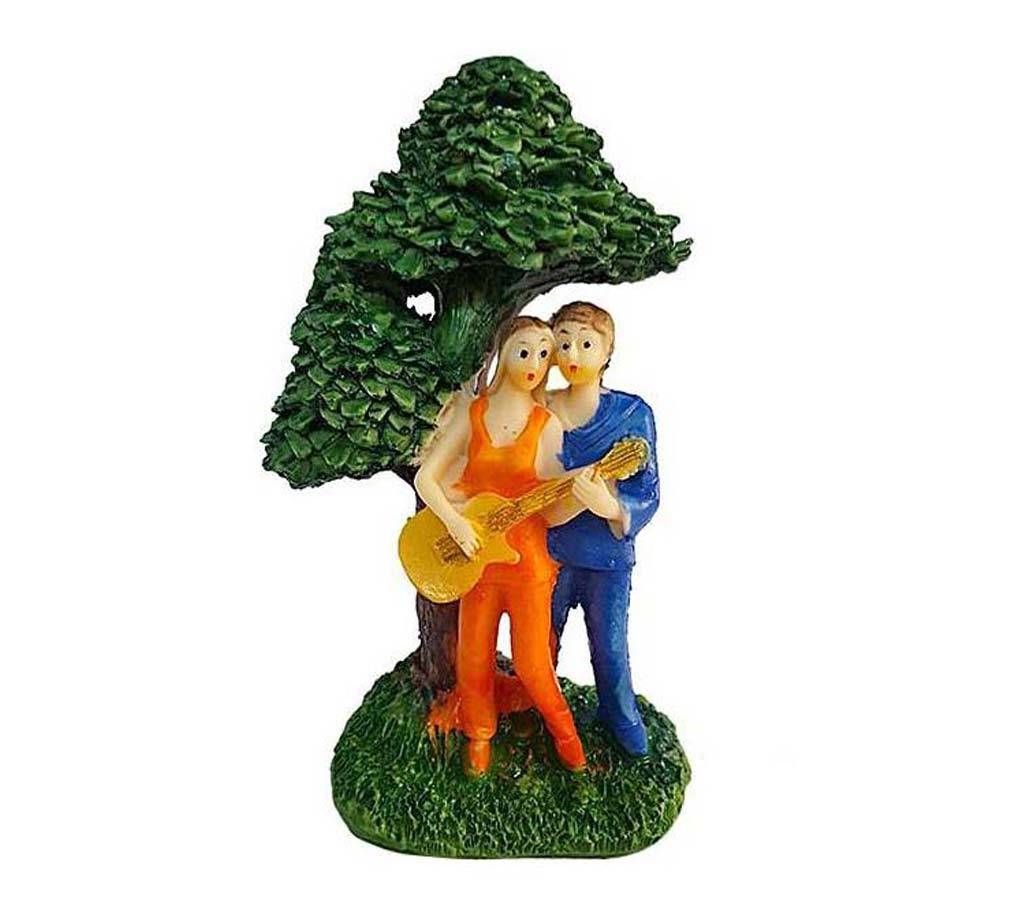 Couple Playing Guitar Under Tree Showpiece - Multi